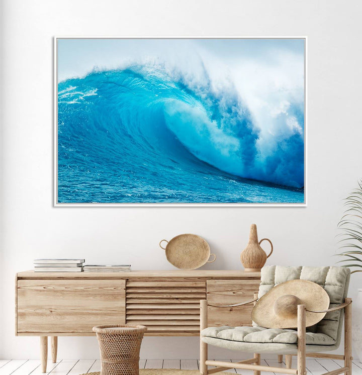 A museum-quality canvas depicting a vibrant blue ocean wave with white foam under a clear sky.