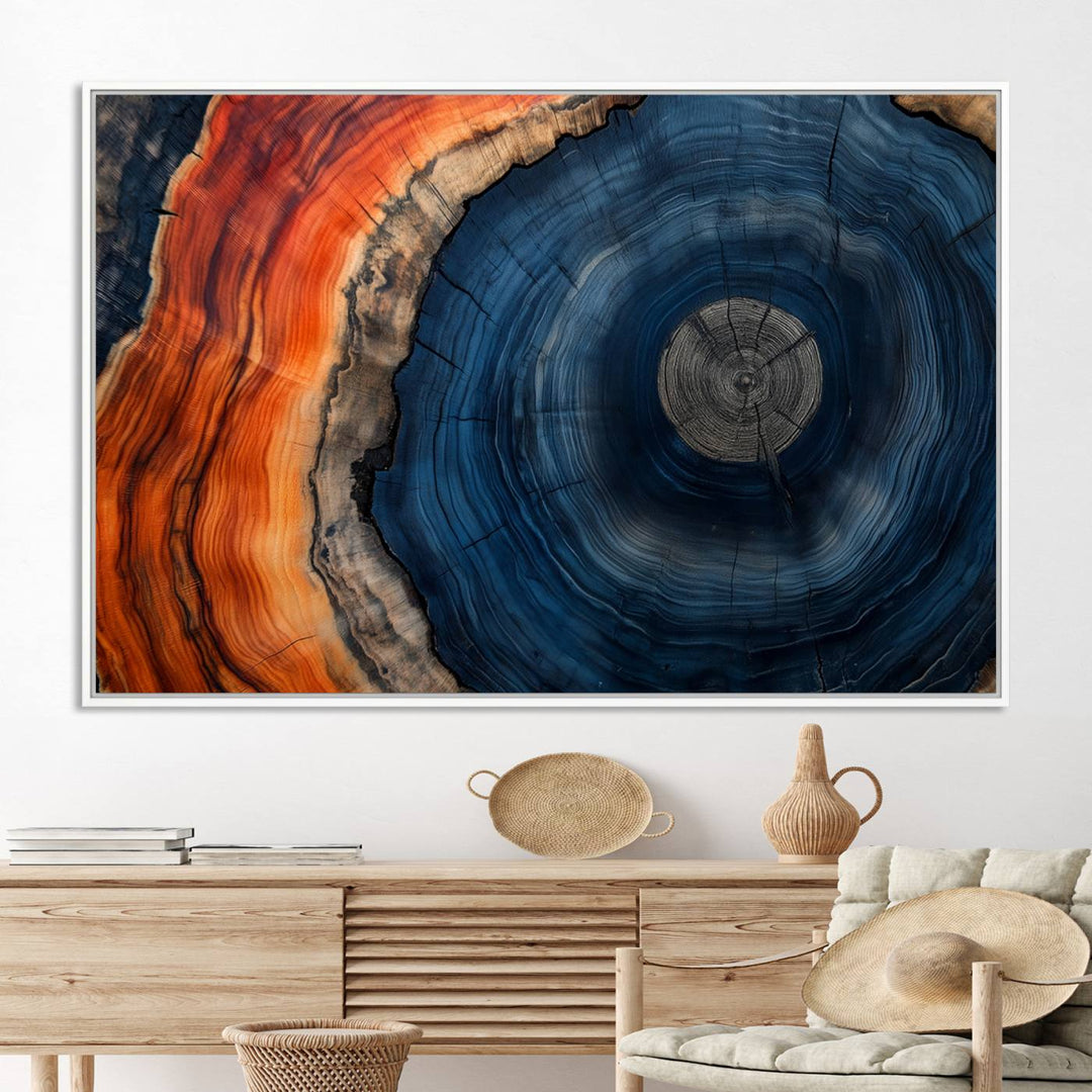 Abstract Tree Ring Wall Art Print on canvas featuring vibrant blue, orange, and brown rings with a natural rustic wood texture. Free shipping available!.