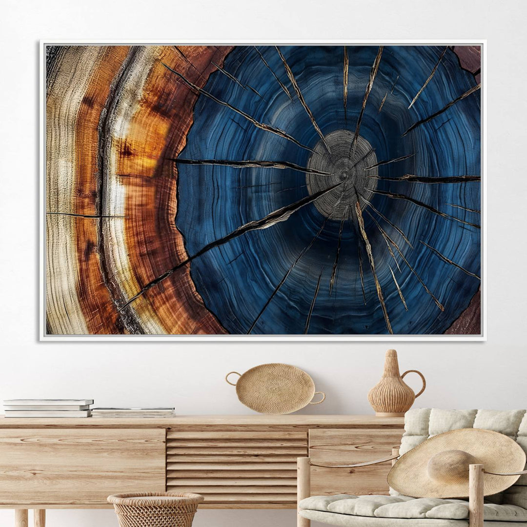 The Abstract Tree Rings Canvas Print features blue, brown, and orange rings that highlight wood grain and natures beauty.