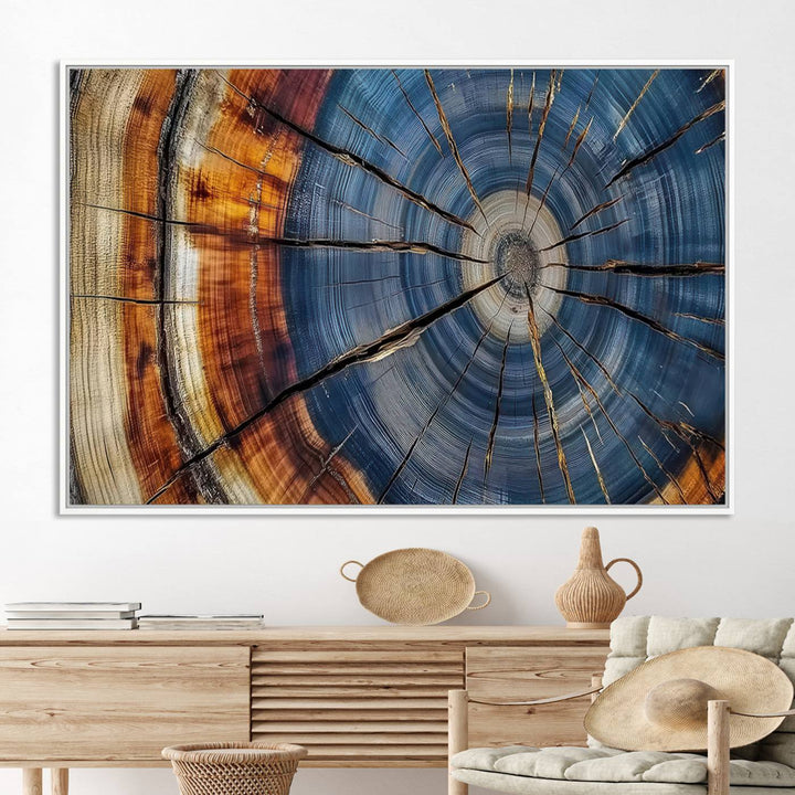 Close-up of blue, brown, and orange wood grain rings on the Abstract Tree Rings Canvas Wall Art Print.