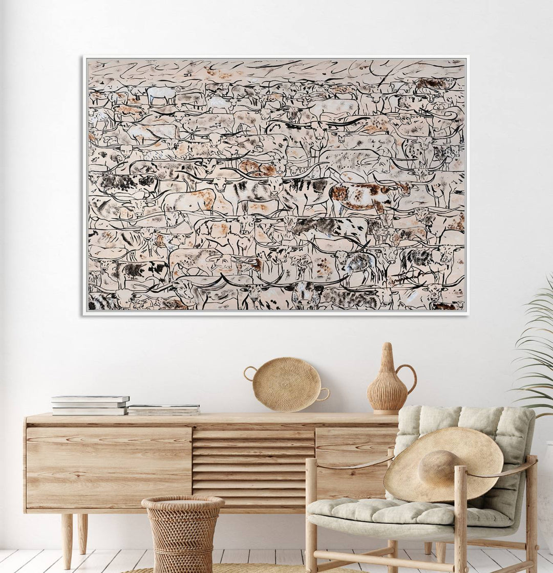 The dining room features a rustic decor highlighted by the Cattle Herd Wall Art.