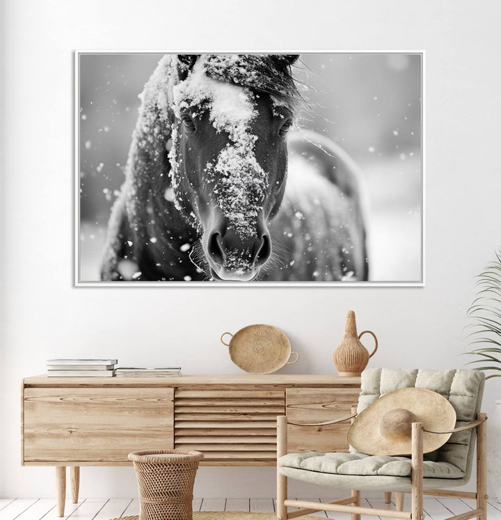 The Black and White Horse Winter Wall Art features a majestic horse with snow-covered hair set against a serene winter backdrop.