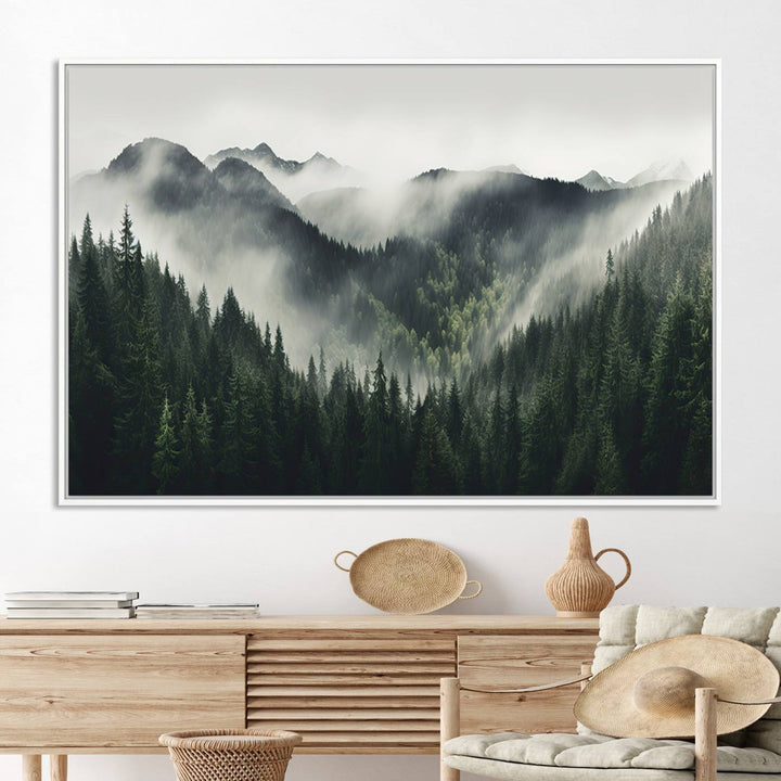 The Misty Forest Canvas Print Wall Art captures a serene misty forest scene with fog and mountains.