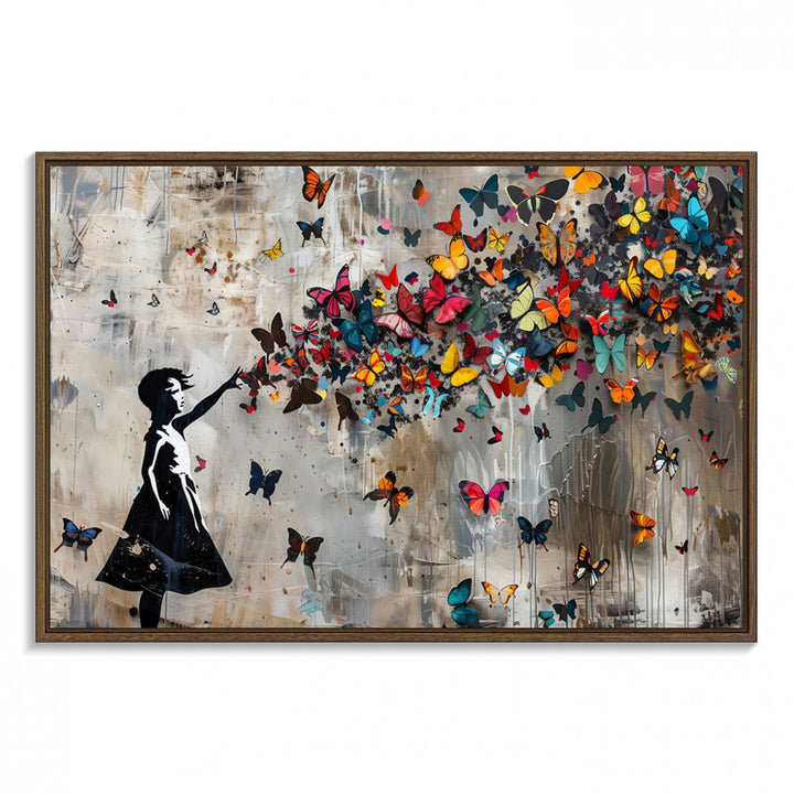 The Banksy Butterfly Girl 3-Piece Modern Graffiti Canvas Wall Art features a silhouette of a girl reaching for butterflies.