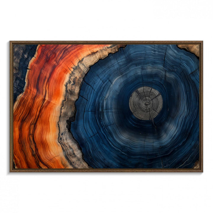 Abstract Tree Ring Wall Art Print on canvas featuring vibrant blue, orange, and brown rings with a natural rustic wood texture. Free shipping available!.