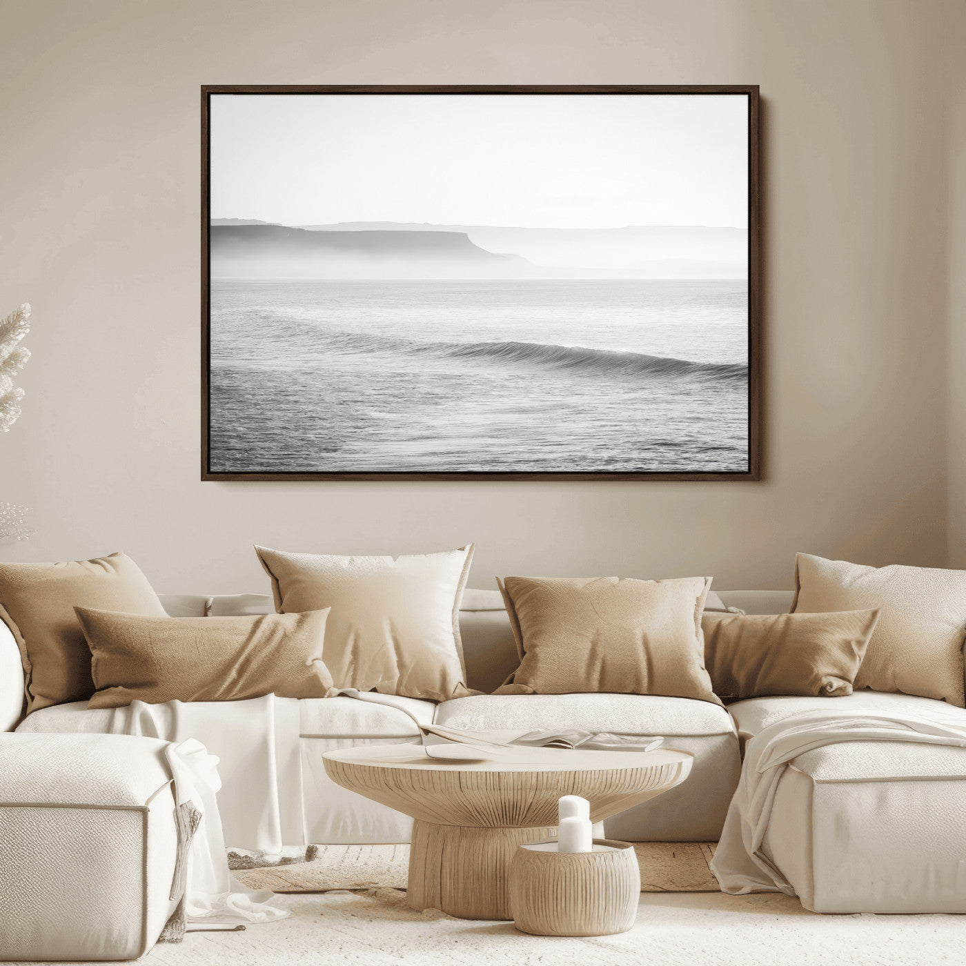 A black and white minimalist seascape featuring soft rolling waves and misty distant cliffs, creating a serene and timeless coastal atmosphere.