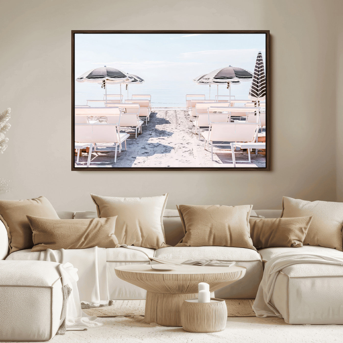 A serene minimalist beach scene featuring striped umbrellas, soft pastel sand, and an elegant lounge setup, creating a tranquil and stylish coastal retreat.