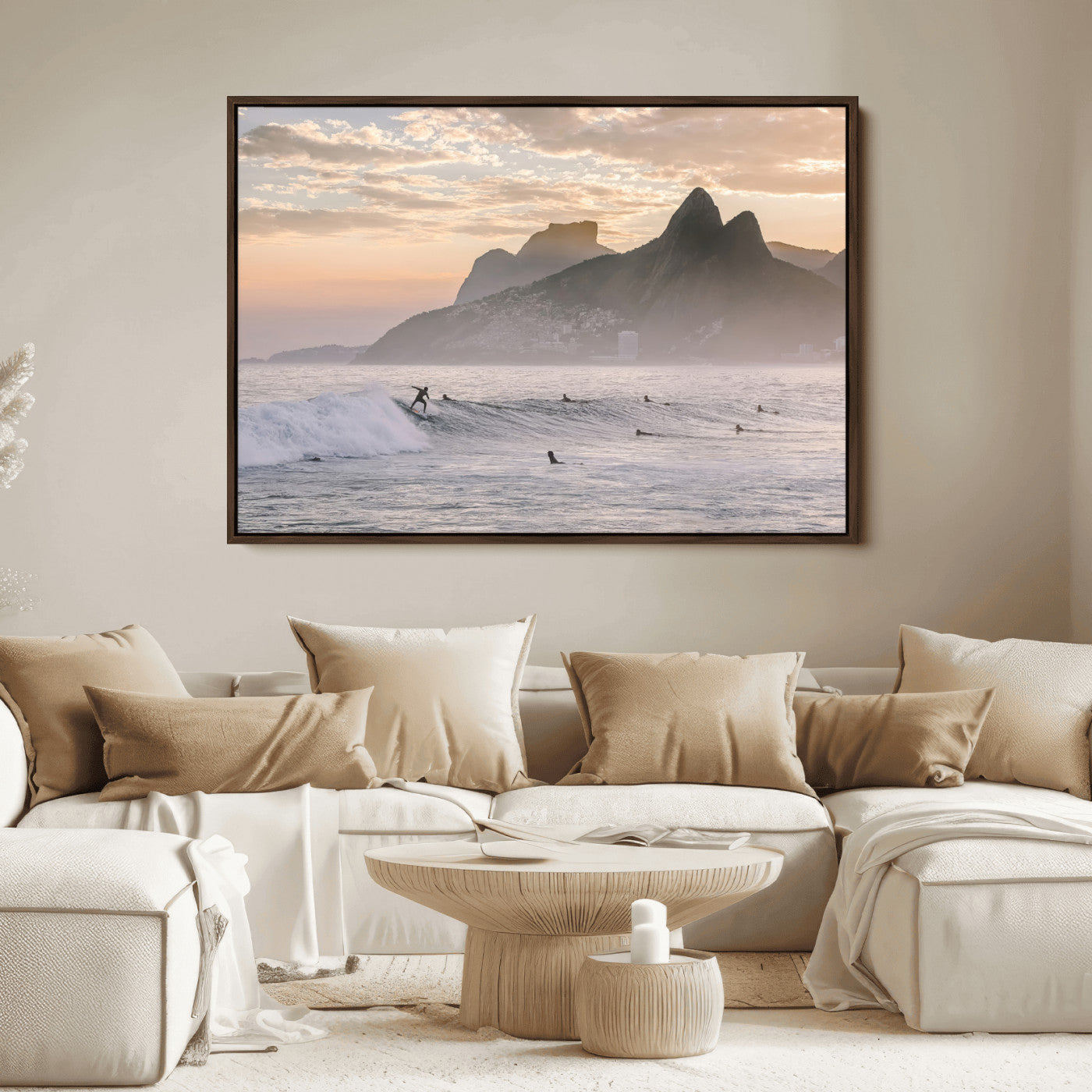 A surfer rides a golden hour wave near misty coastal mountains, surrounded by fellow surfers, capturing the spirit of a coastal adventure.
