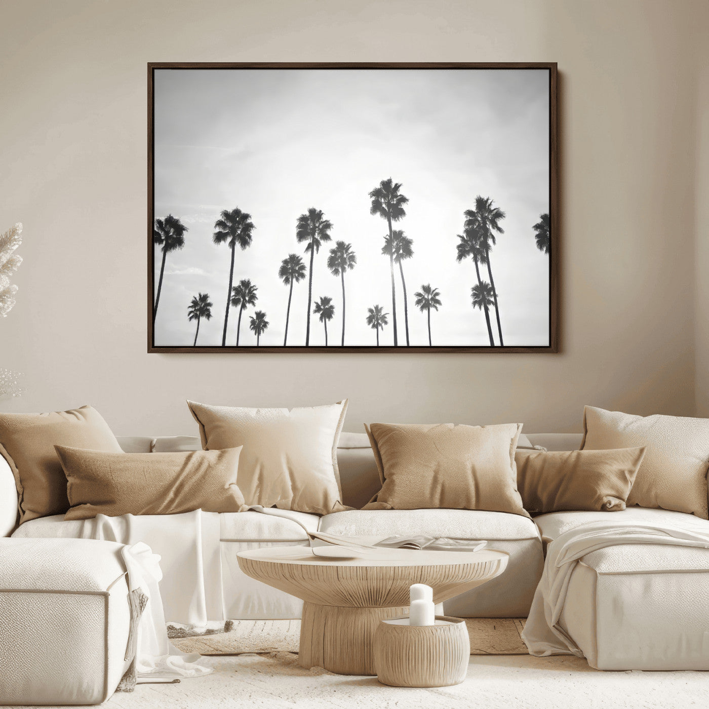 A black and white minimalist scene featuring tall palm trees silhouetted against a bright sky, creating a dreamy and timeless tropical aesthetic.