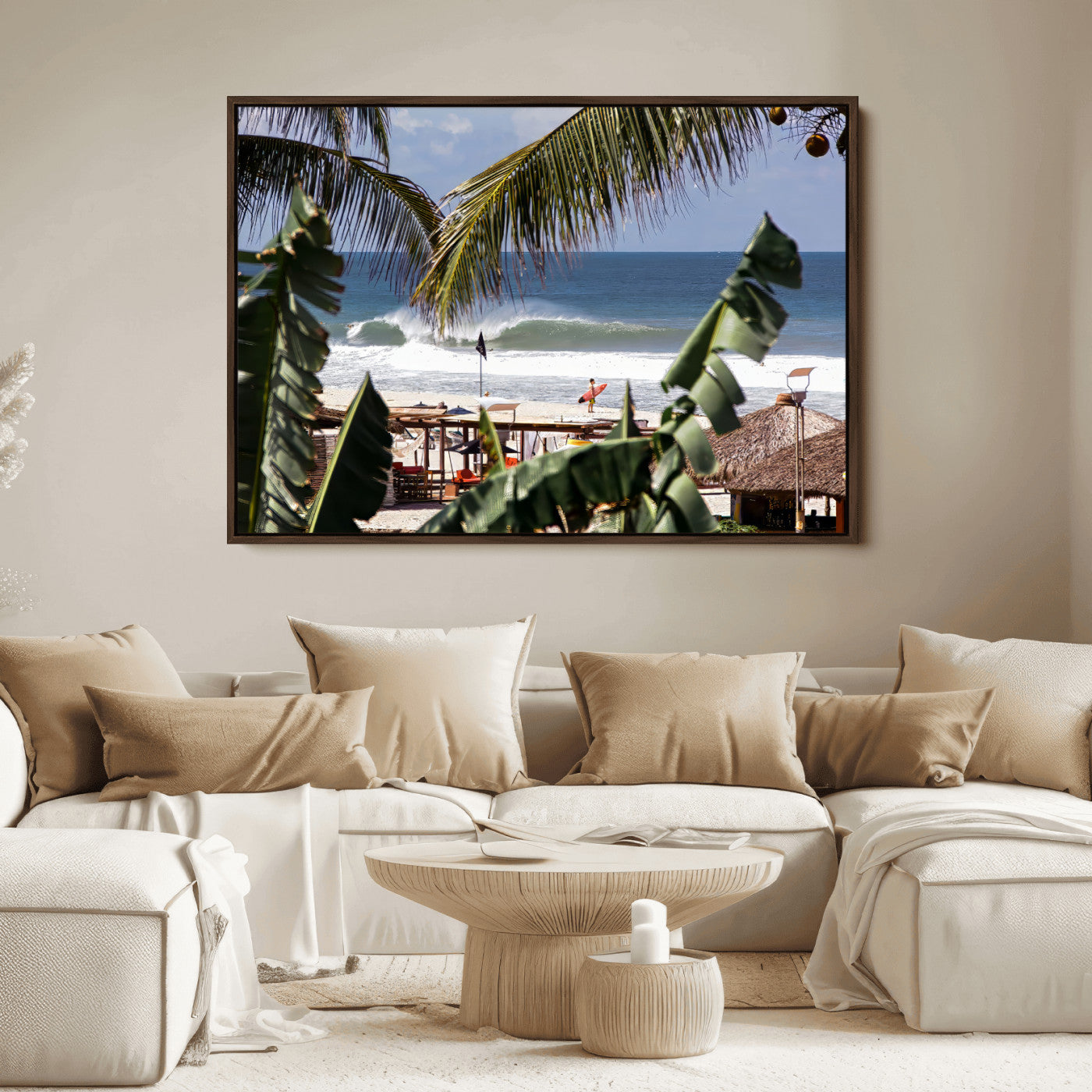 Canvas wall art of a tropical surf scene framed by palm trees, with a surfer on the shore and waves rolling in, ideal for beach-themed decor.