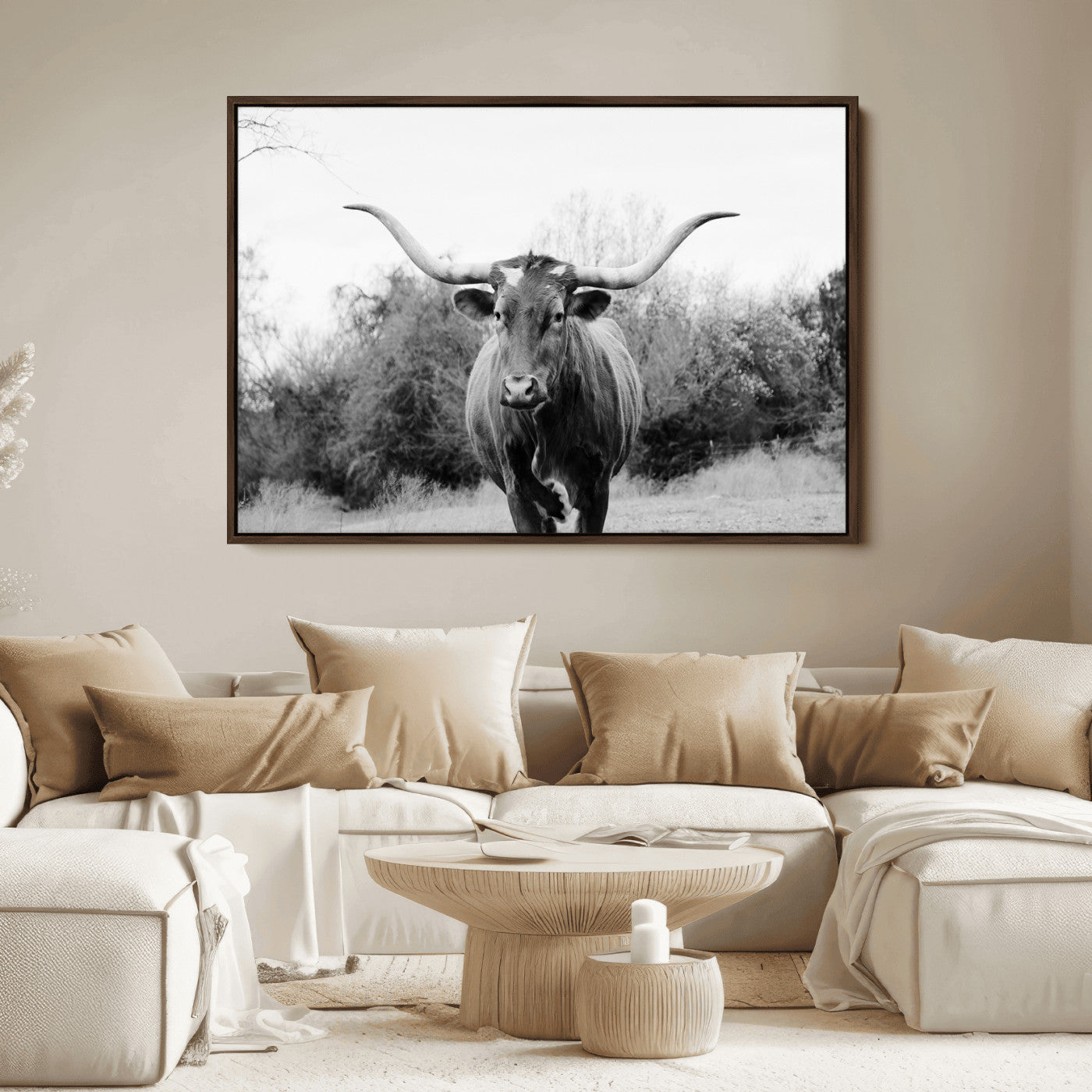 Black and white photo of a Longhorn cow facing camera, ideal for rustic, farmhouse, or western-themed home wall decor.