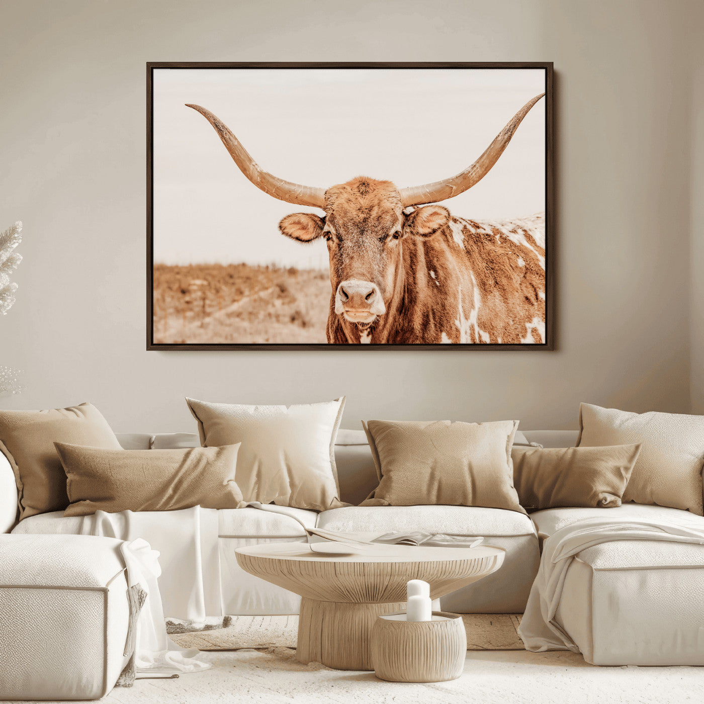 Sepia-toned Texas Longhorn facing forward in a dry field, perfect for rustic farmhouse or western-themed neutral home decor.