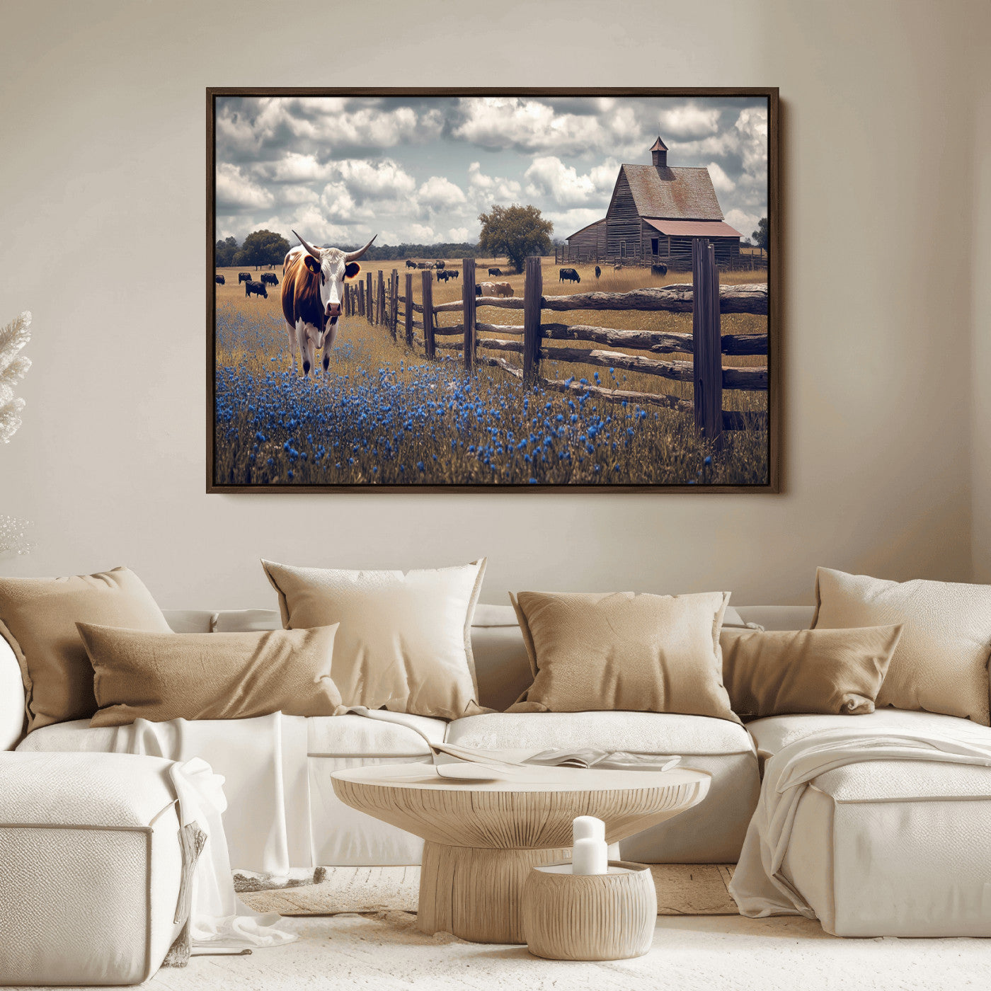 Framed canvas print of a Texas Longhorn near a rustic barn and fence, ideal for farmhouse or western-style home wall decor.