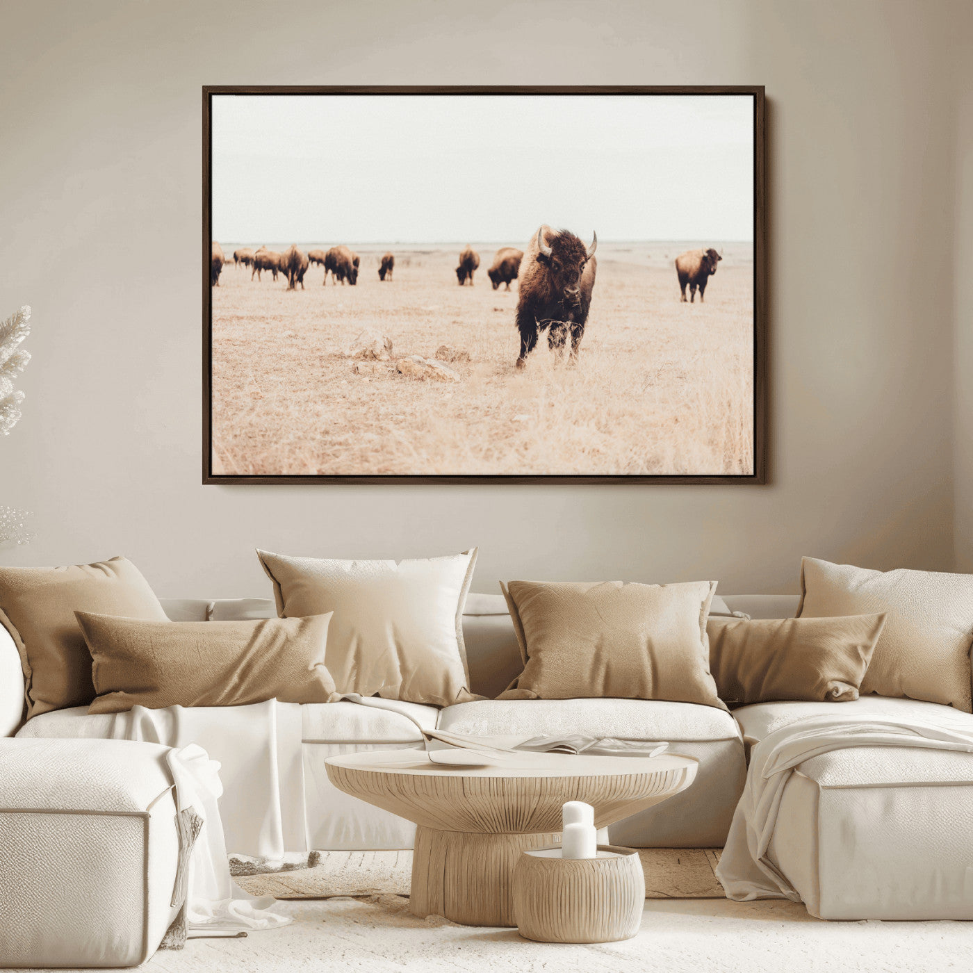 Herd of bison roaming a vast prairie with golden grass under a soft sky, creating a rustic and Western landscape, ideal for wall art.