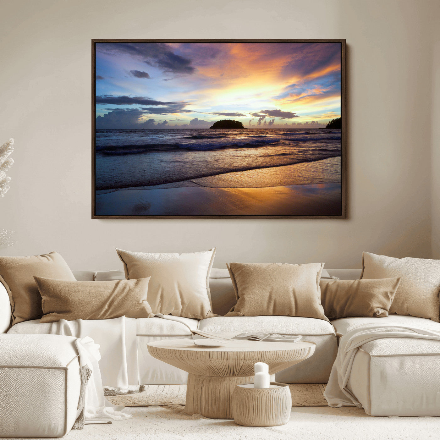 A tropical beach at sunset with waves gently washing ashore, reflecting golden and purple hues in the sky, creating a tranquil coastal scene.
