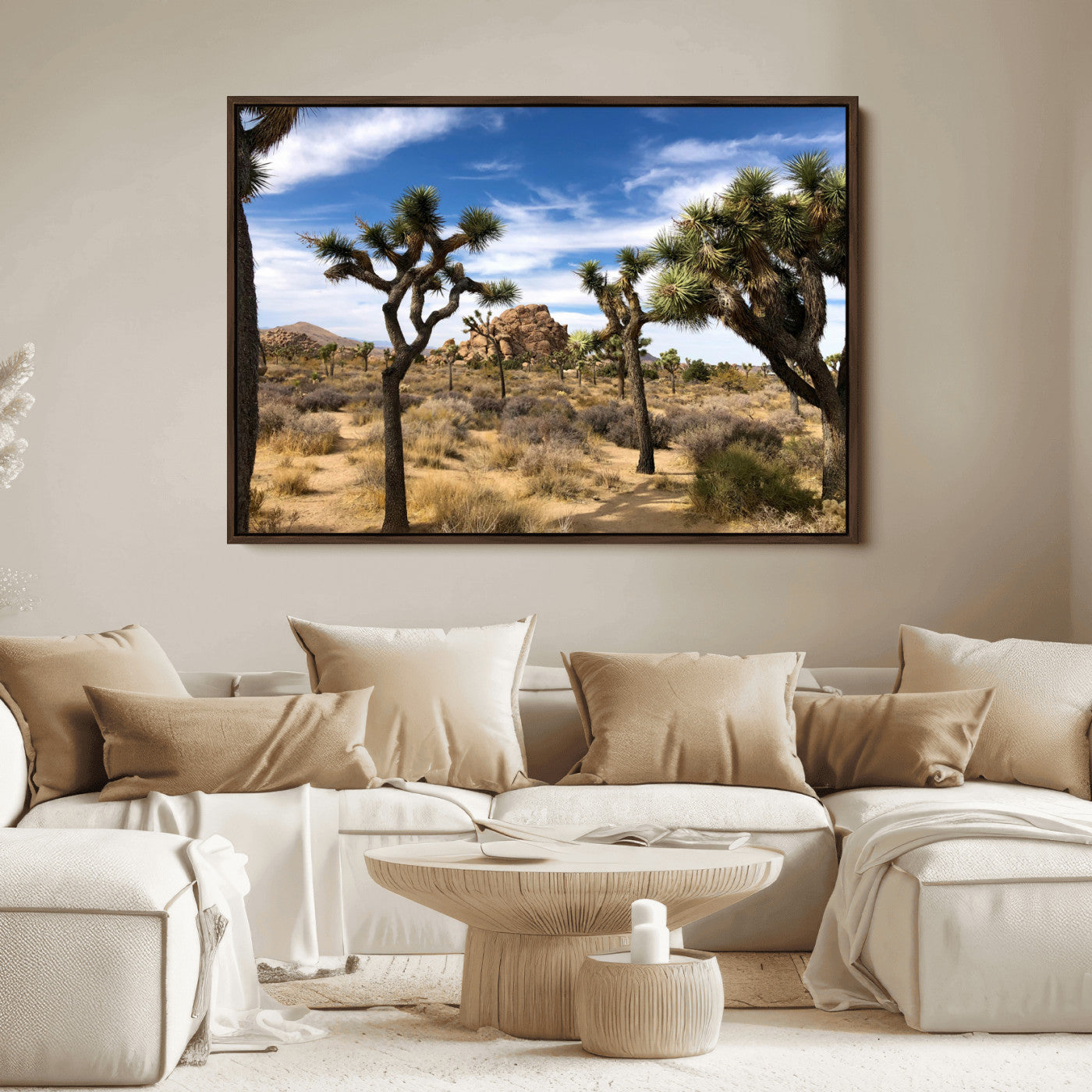 Scenic Joshua Tree landscape with rugged desert terrain, golden dry grass, and a deep blue sky, creating a warm, rustic Southwestern aesthetic.