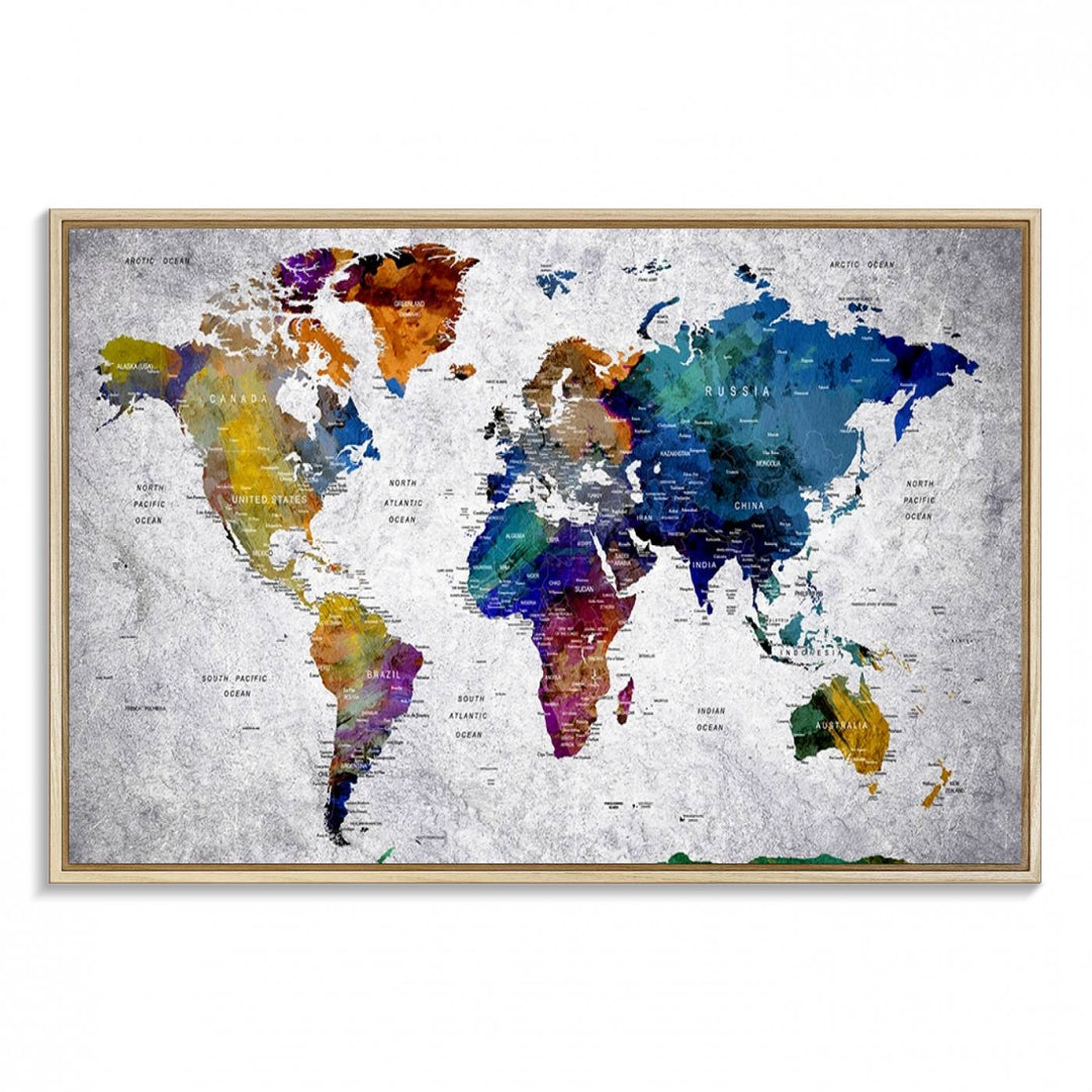 The World Map Art Canvas Print, featuring country names on a grunge-stained gray background, is perfect for stylish home decor.