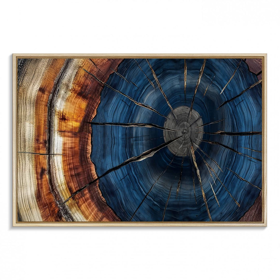 The Abstract Tree Rings Canvas Print features blue, brown, and orange rings that highlight wood grain and natures beauty.