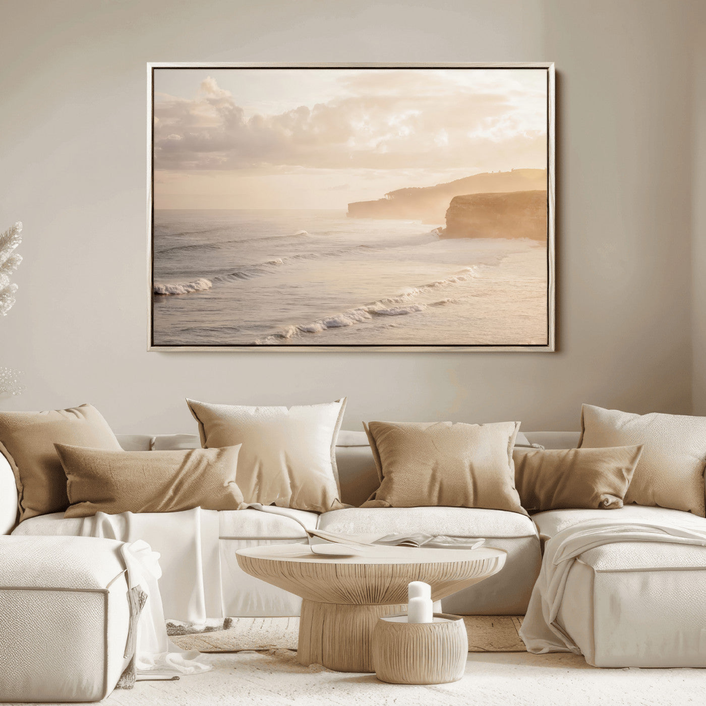 Golden hour seascape with misty cliffs and gentle waves rolling towards the shore, capturing a tranquil and warm coastal atmosphere.