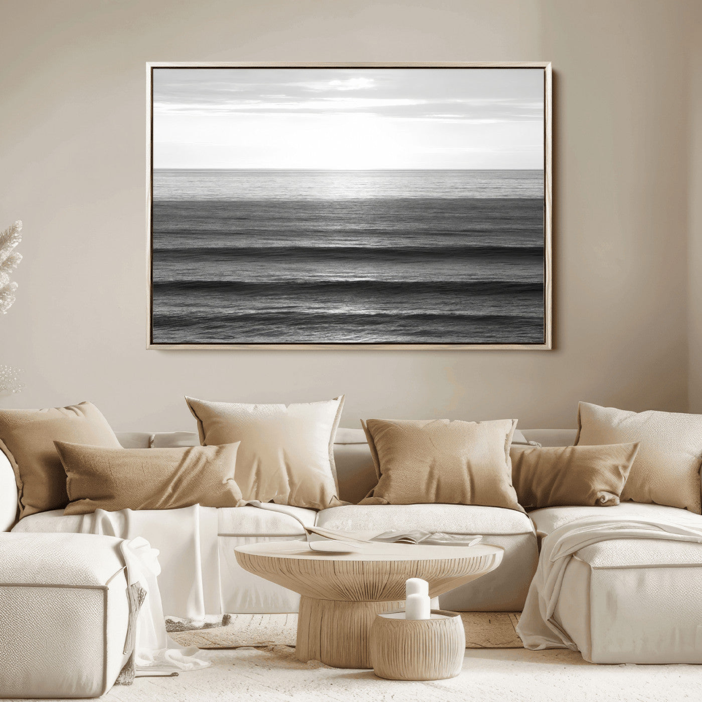 Minimalist black and white ocean view with layered waves reflecting sunlight, evoking a sense of calm and coastal serenity.