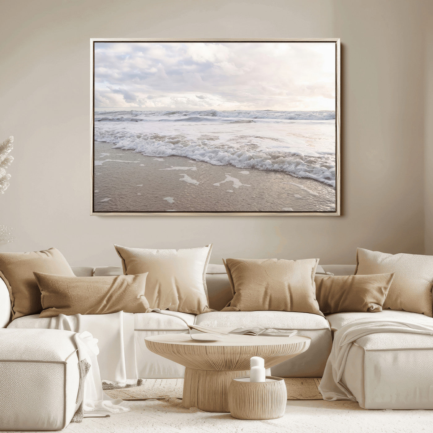 Peaceful ocean waves rolling onto the sandy shore under soft light, perfect for neutral or coastal minimalist decor themes.
