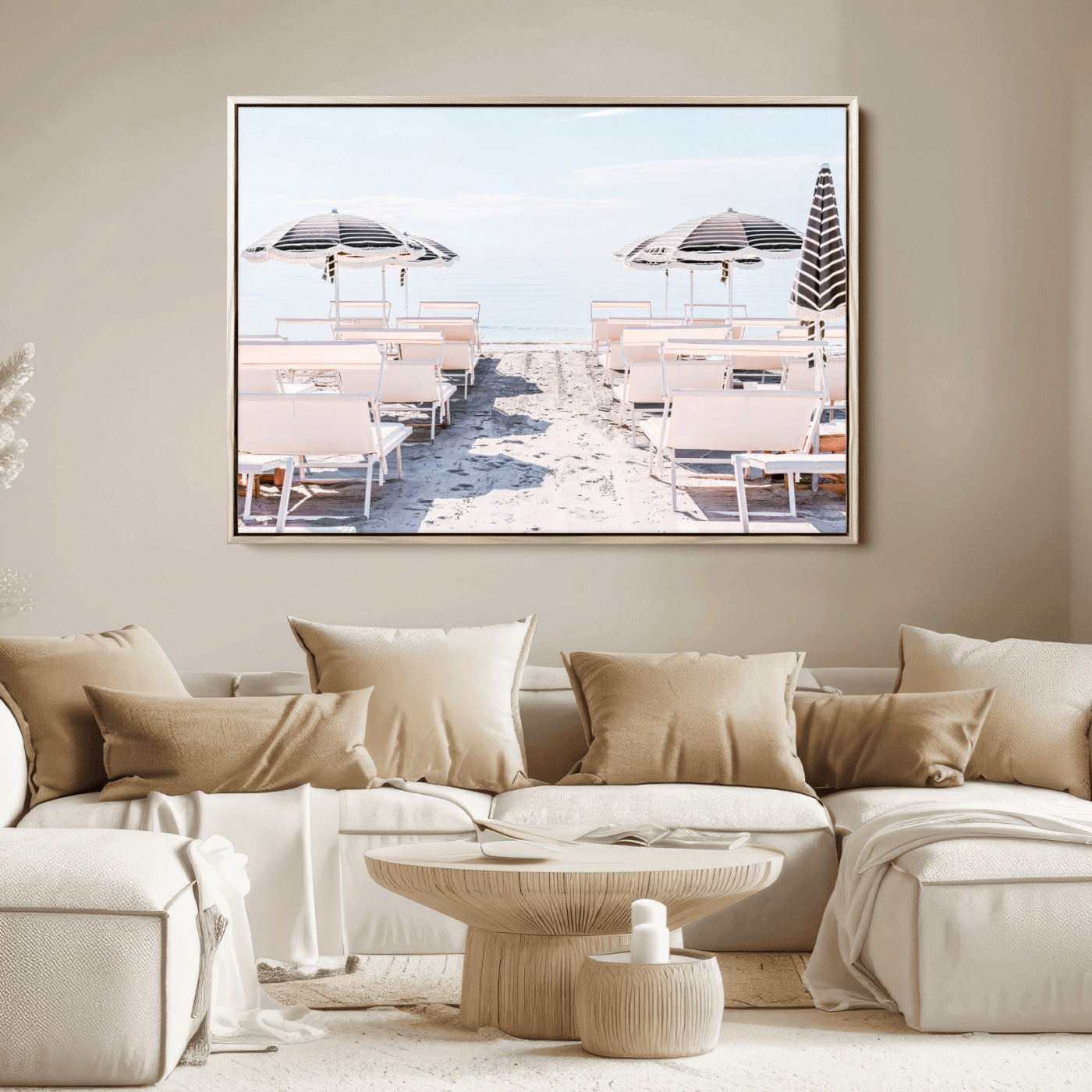 A serene minimalist beach scene featuring striped umbrellas, soft pastel sand, and an elegant lounge setup, creating a tranquil and stylish coastal retreat.