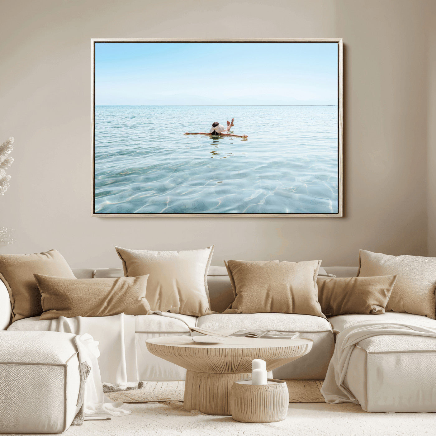A peaceful minimalist scene of a person floating on crystal-clear water, surrounded by a vast open horizon, capturing relaxation and serenity in a tranquil aquatic setting.