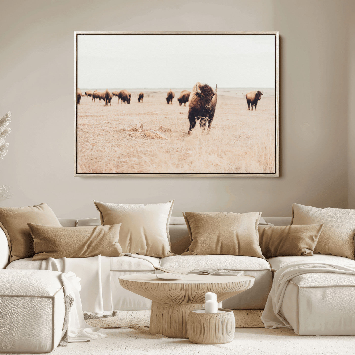 Herd of bison roaming a vast prairie with golden grass under a soft sky, creating a rustic and Western landscape, ideal for wall art.