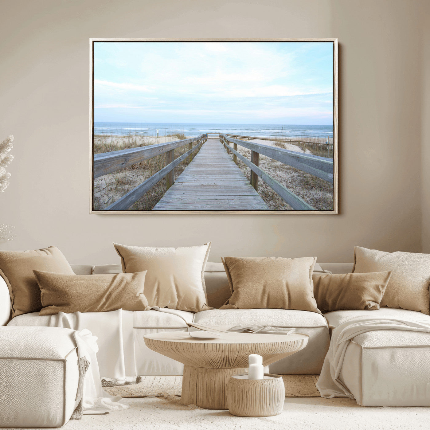 Wooden boardwalk leading to a peaceful beach with gentle ocean waves under a soft pastel sky, perfect for coastal and nautical home decor.