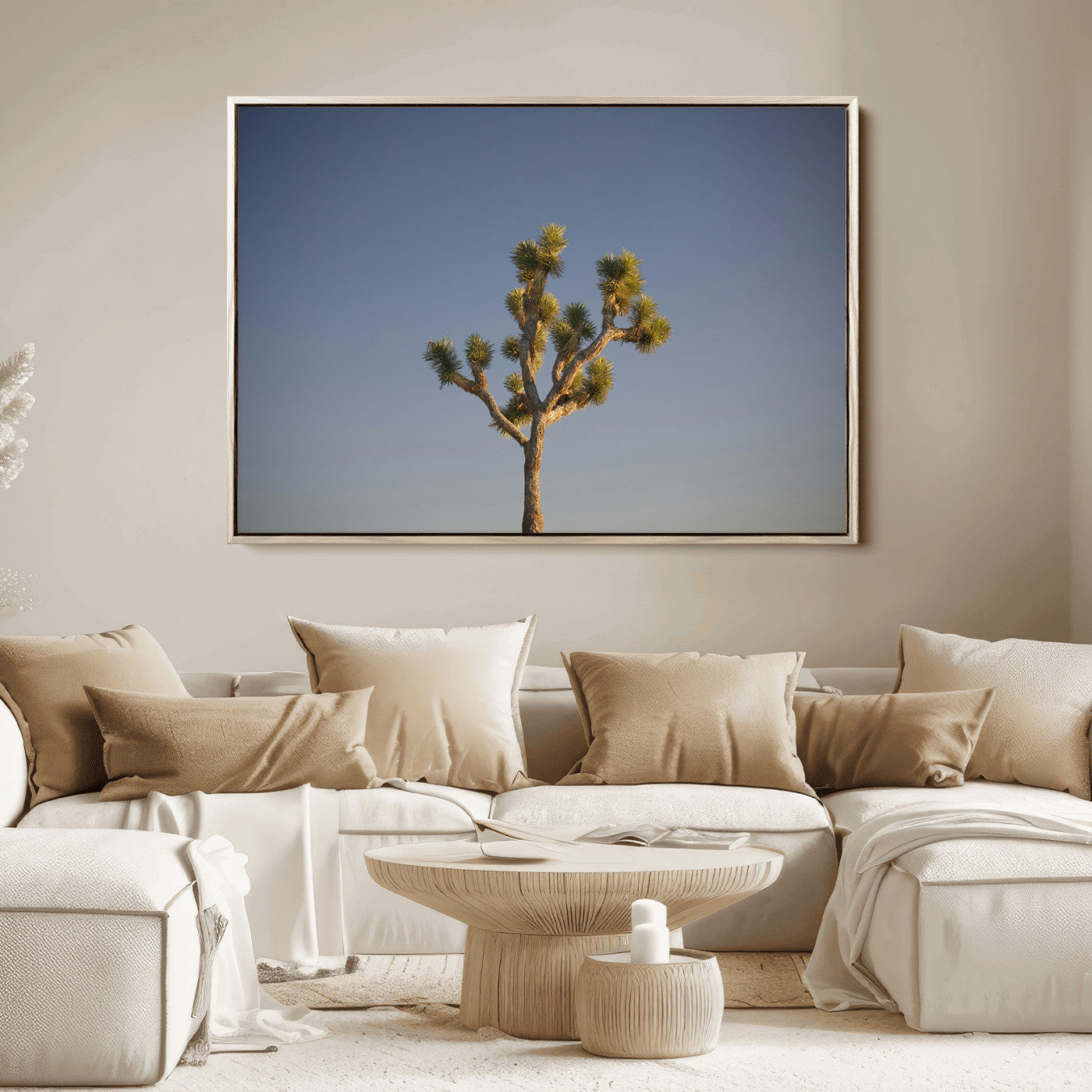 A lone Joshua Tree standing against a deep blue sky, capturing the serene and rugged beauty of the Southwestern desert landscape.