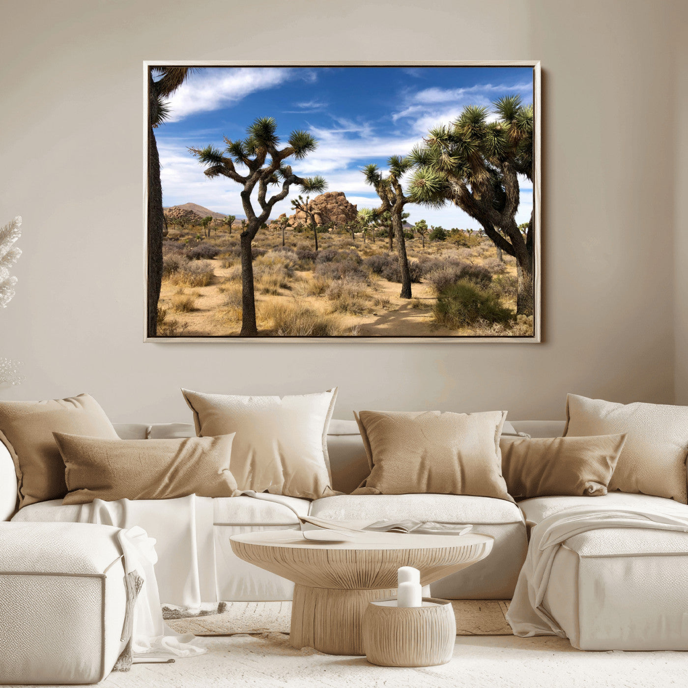 Scenic Joshua Tree landscape with rugged desert terrain, golden dry grass, and a deep blue sky, creating a warm, rustic Southwestern aesthetic.