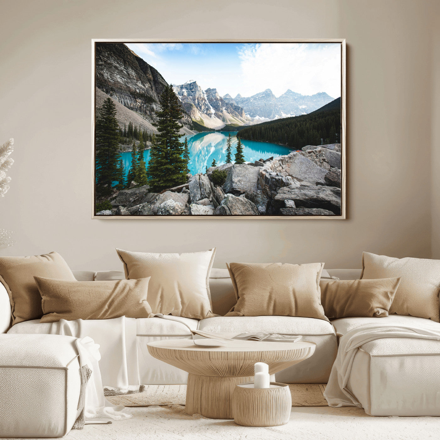 Stunning view of Moraine Lake with turquoise waters reflecting snow-capped mountains and evergreen trees, creating a peaceful alpine decor.