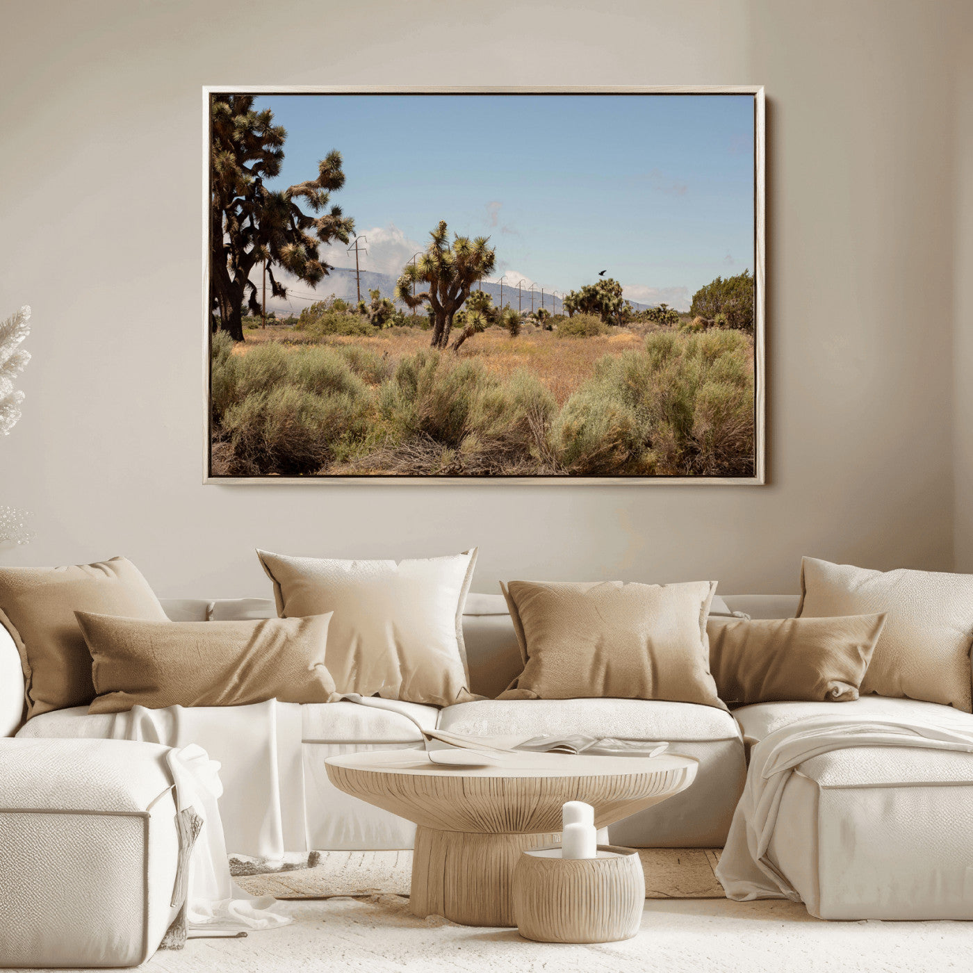 Scenic desert landscape with Joshua trees, dry grass, and distant mountains under a clear blue sky, perfect for southwestern and rustic decor.