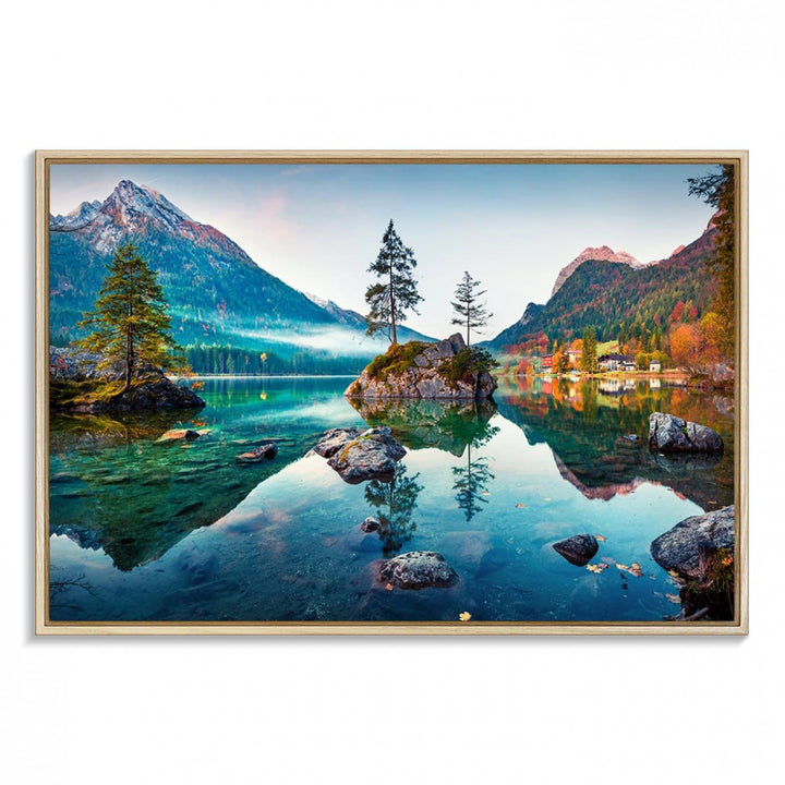 The 3-panel wall art showcases a serene mountain lake with rocky islands and trees, creating an ideal focal point for dining rooms or offices.