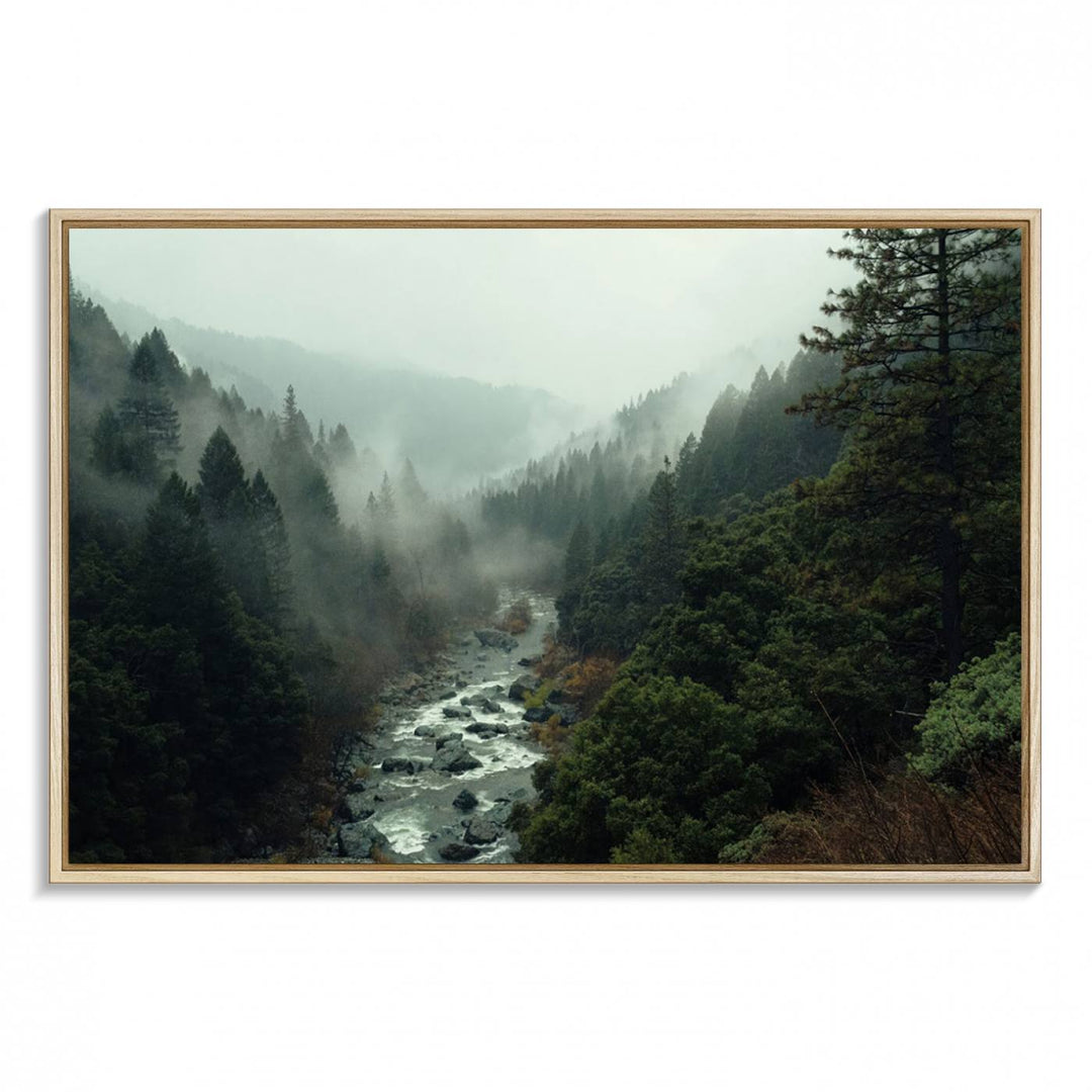 The Misty Forest Wall Art features a serene landscape with a misty river and evergreens, ideal for enhancing the ambiance of any living room or cabin.