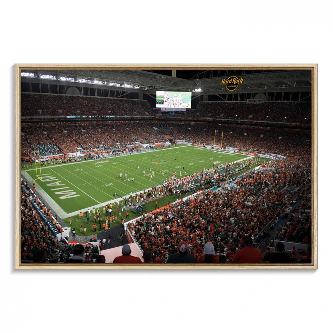 Aerial view of a Miami Hurricanes game at Hard Rock Stadium captured on canvas print, showcasing the teams on the field and fans in the stands.