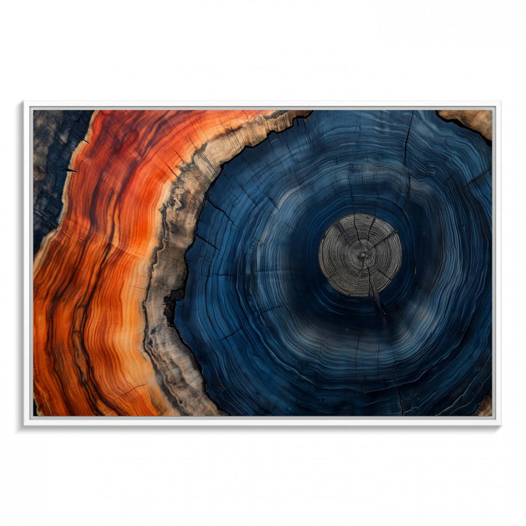 Abstract Tree Ring Wall Art Print on canvas featuring vibrant blue, orange, and brown rings with a natural rustic wood texture. Free shipping available!.