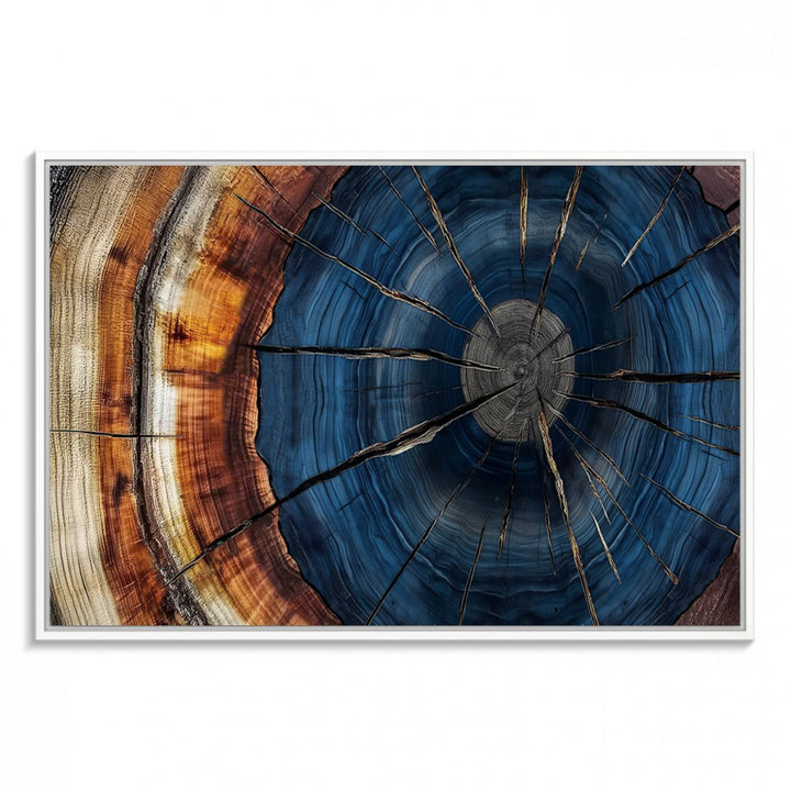 The Abstract Tree Rings Canvas Print features blue, brown, and orange rings that highlight wood grain and natures beauty.