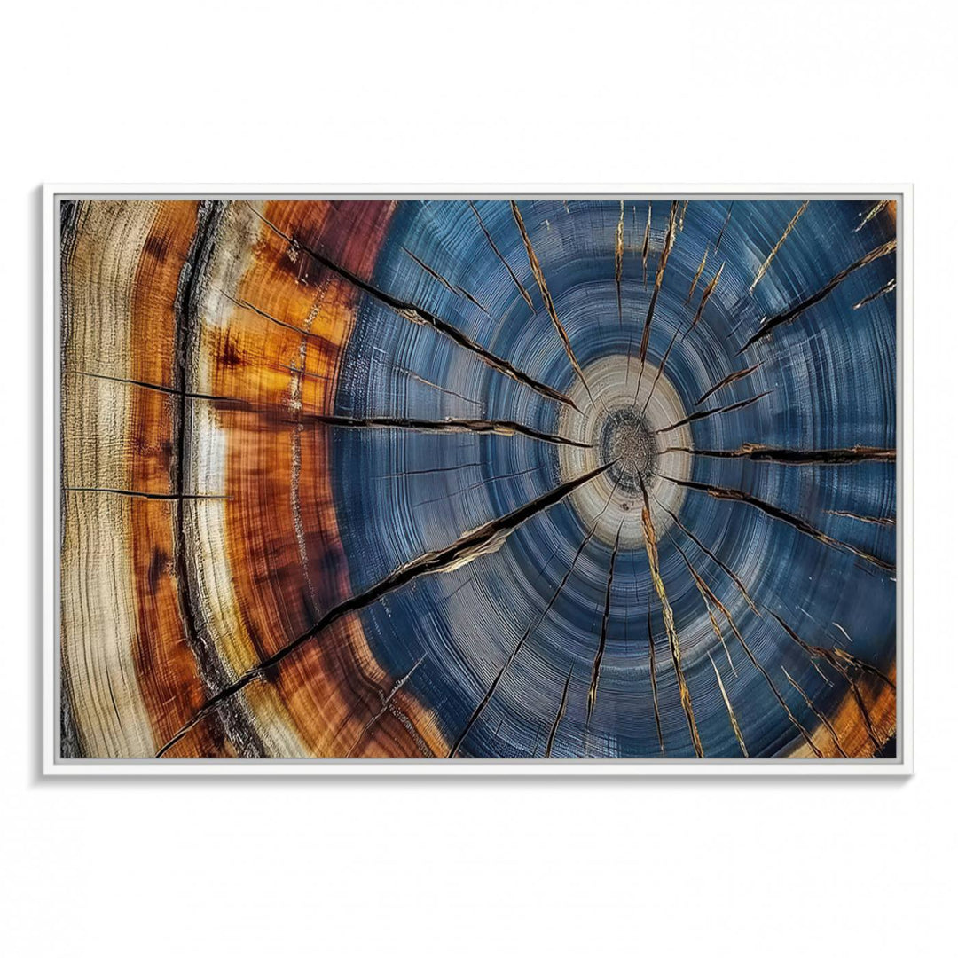 Close-up of blue, brown, and orange wood grain rings on the Abstract Tree Rings Canvas Wall Art Print.