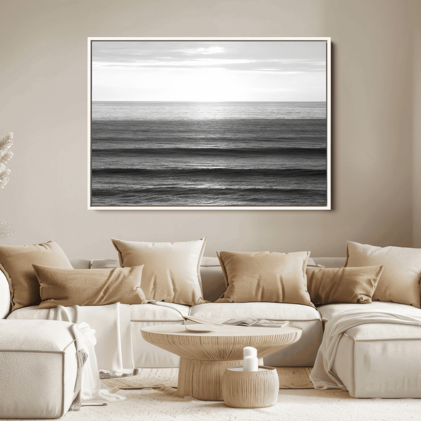 Minimalist black and white ocean view with layered waves reflecting sunlight, evoking a sense of calm and coastal serenity.