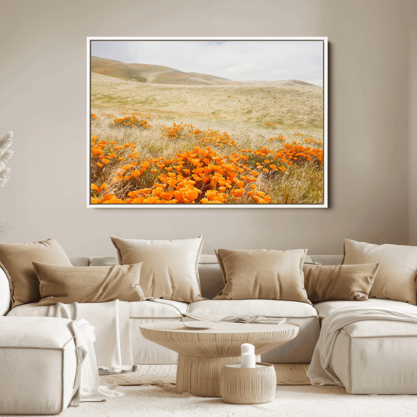 A golden field with vibrant orange poppies blooming across rolling hills under a soft, sunlit sky, creating a warm and rustic landscape.