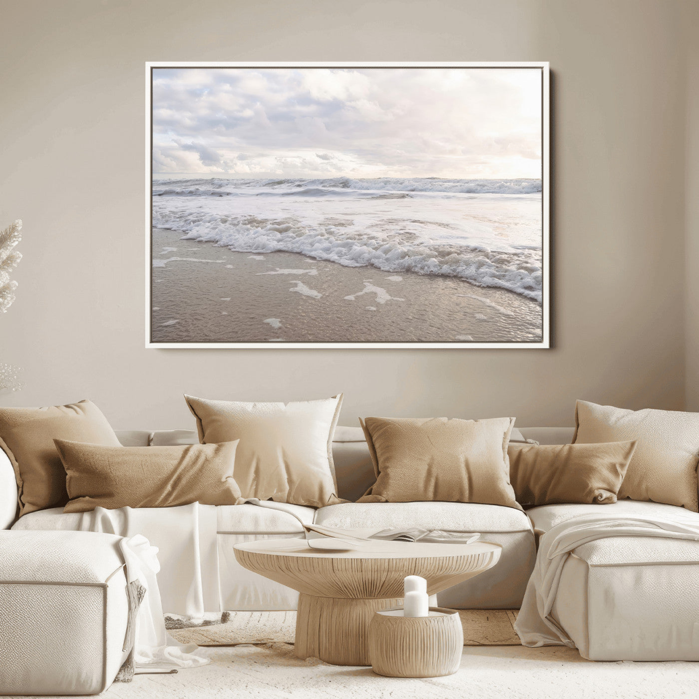 Peaceful ocean waves rolling onto the sandy shore under soft light, perfect for neutral or coastal minimalist decor themes.