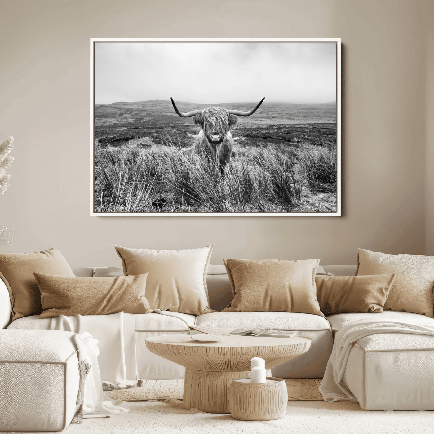 A black and white portrait of a Highland cow in a foggy Scottish countryside, capturing a rustic aesthetic and tranquil farm escape.
