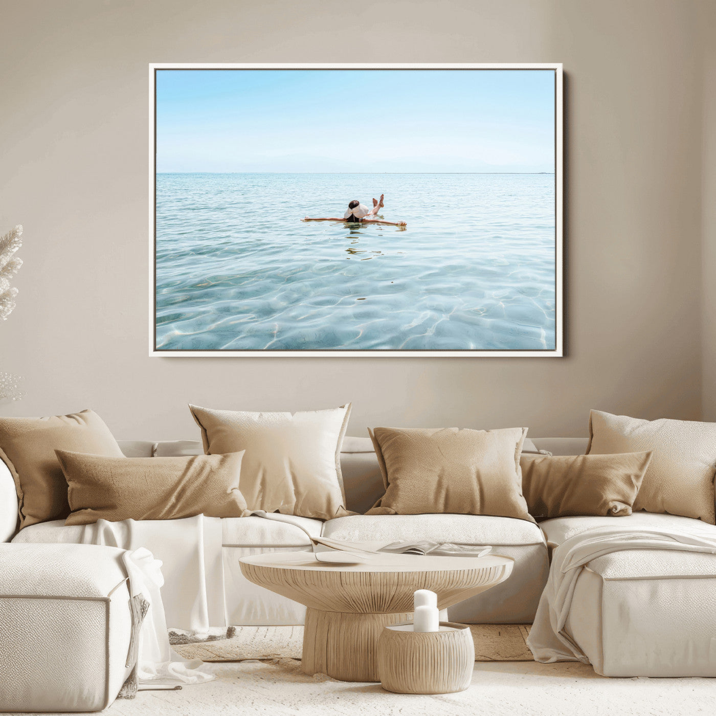 A peaceful minimalist scene of a person floating on crystal-clear water, surrounded by a vast open horizon, capturing relaxation and serenity in a tranquil aquatic setting.