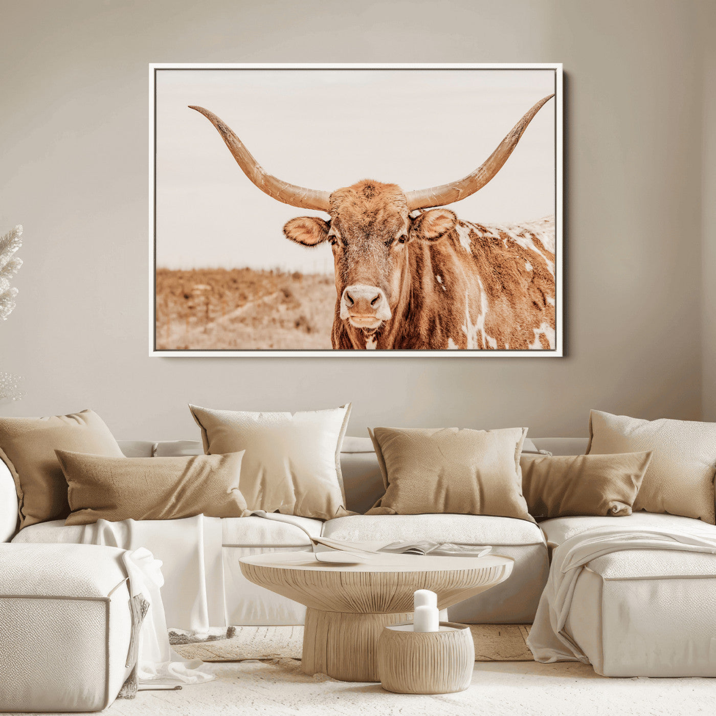 Sepia-toned Texas Longhorn facing forward in a dry field, perfect for rustic farmhouse or western-themed neutral home decor.