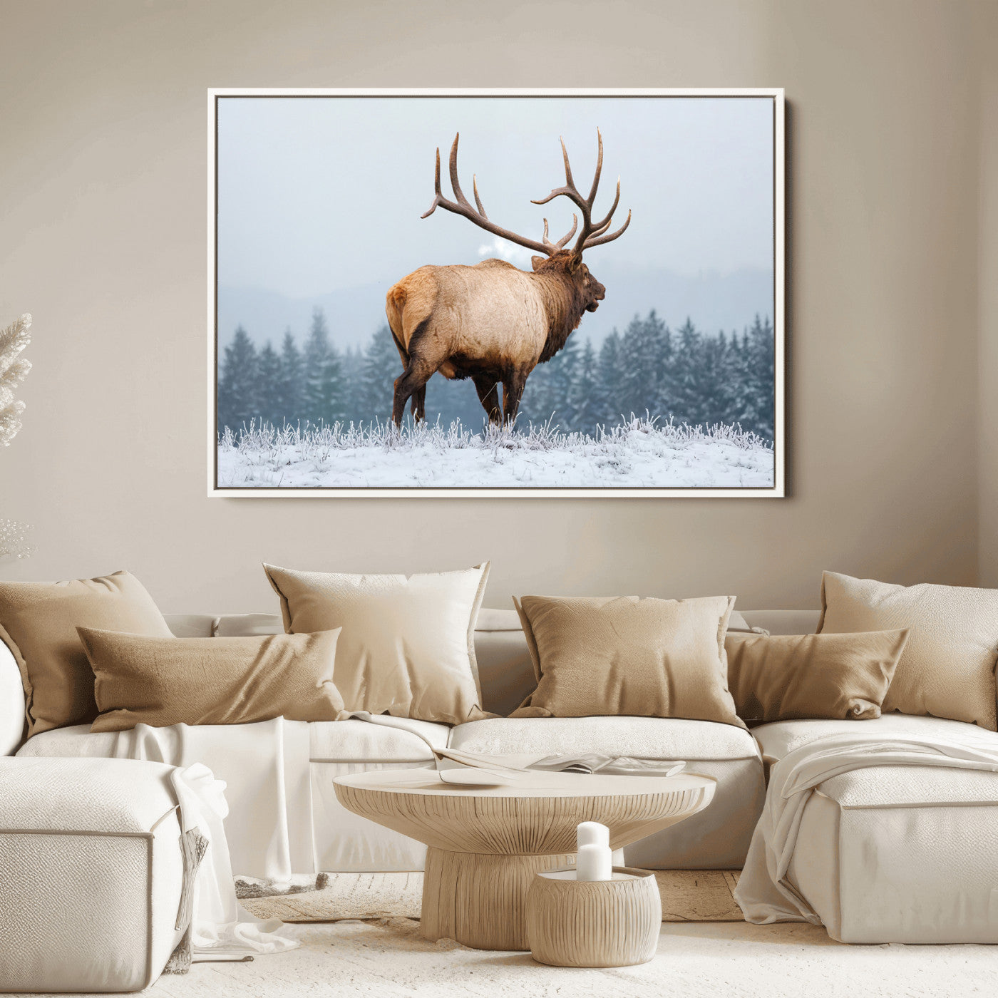 Large elk standing in a snowy field with pine trees in the background, ideal for rustic cabin or lodge-style wall decor.