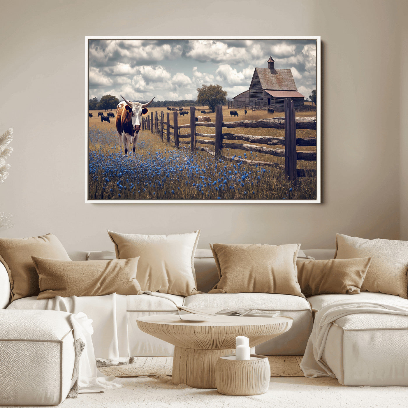 Framed canvas print of a Texas Longhorn near a rustic barn and fence, ideal for farmhouse or western-style home wall decor.