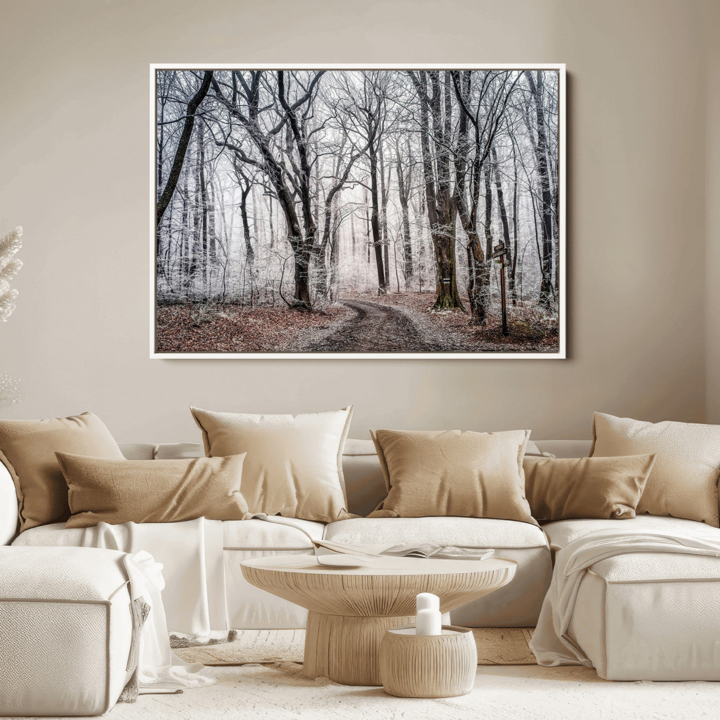 Snow-covered trees in a misty winter forest with a winding path, creating a serene and mysterious atmosphere, perfect for nature-inspired wall art.