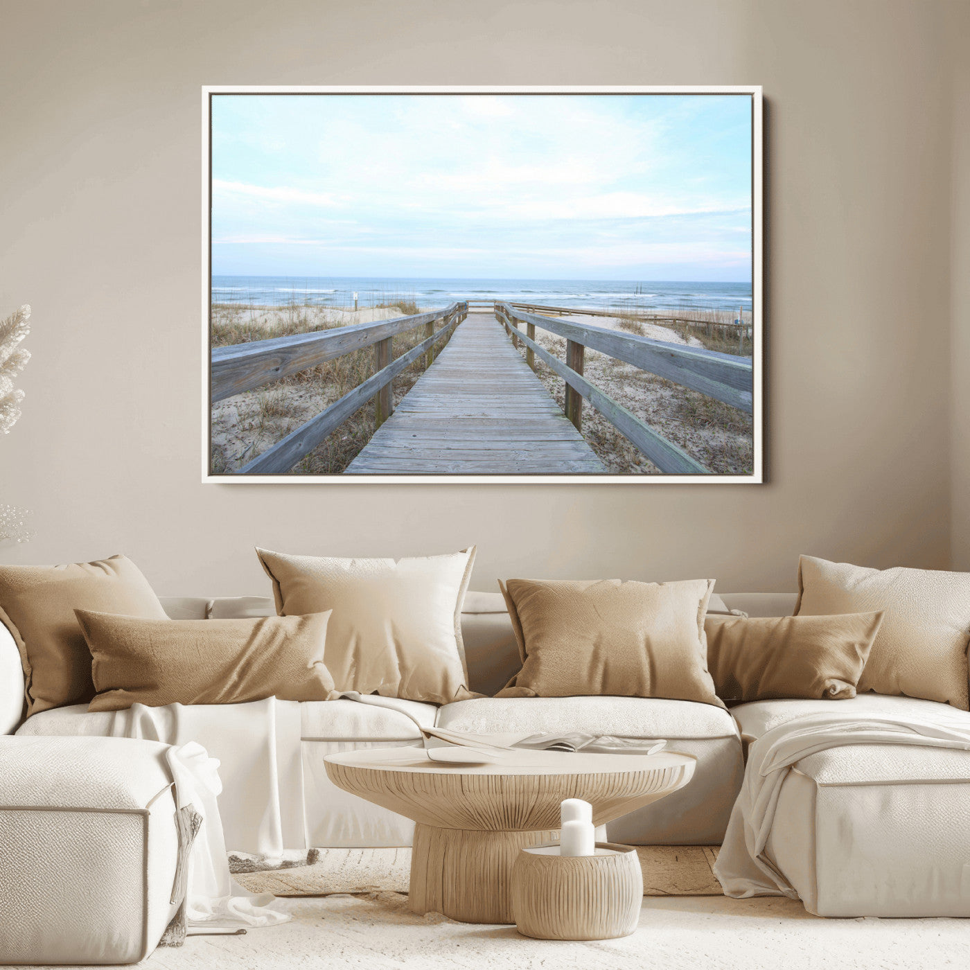 Wooden boardwalk leading to a peaceful beach with gentle ocean waves under a soft pastel sky, perfect for coastal and nautical home decor.