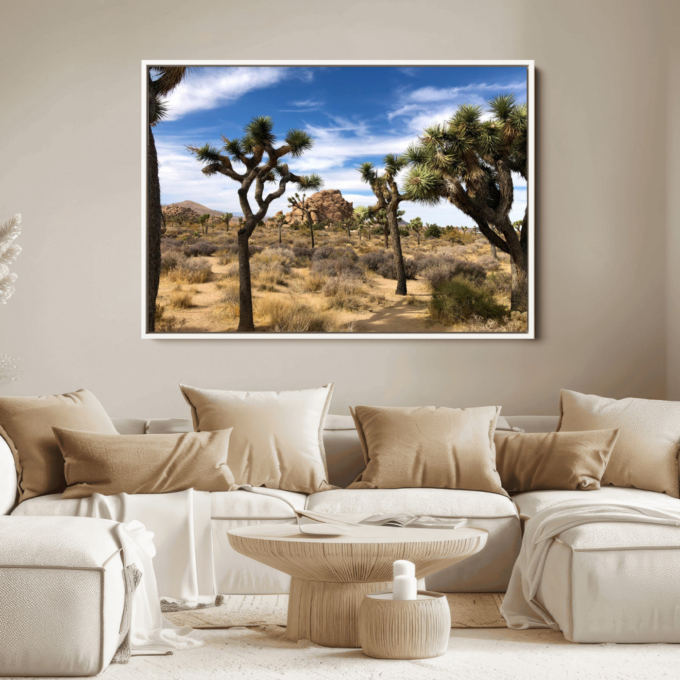 Scenic Joshua Tree landscape with rugged desert terrain, golden dry grass, and a deep blue sky, creating a warm, rustic Southwestern aesthetic.